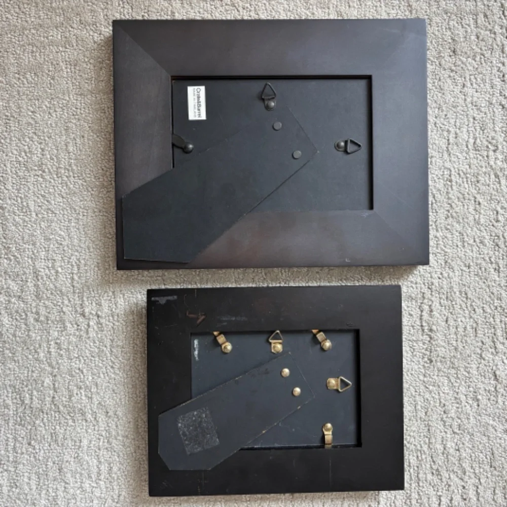 2 black frames, Crate & Barrel and unknown.